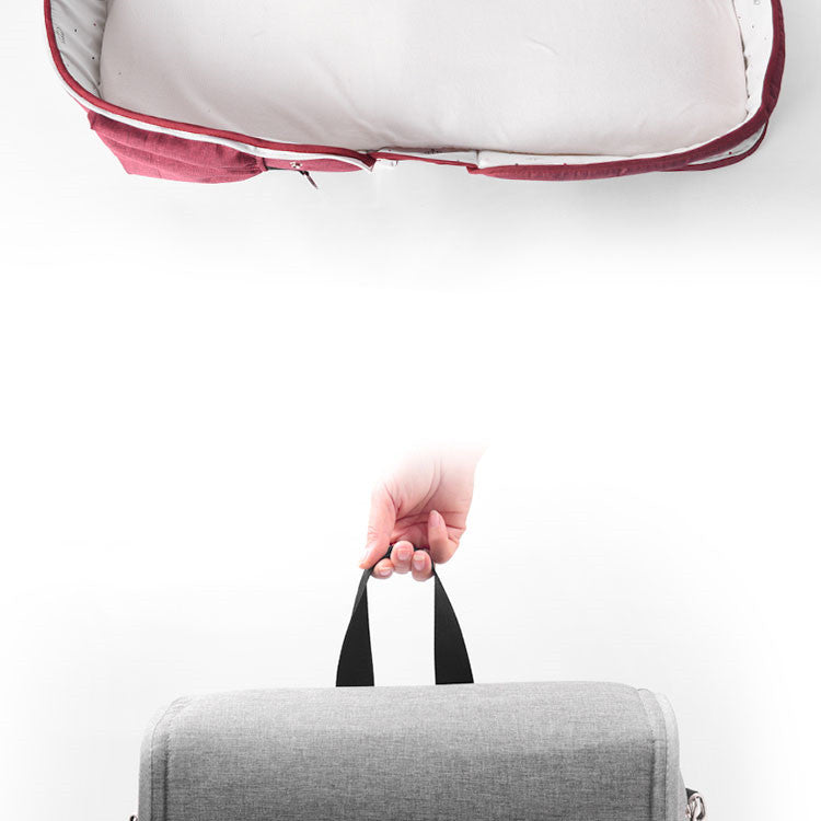 Cuna de viaje - plegada en mochila
